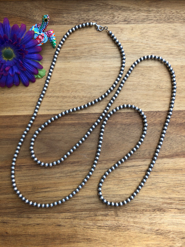 60" 6MM " Navajo Style" Sterling Pearls